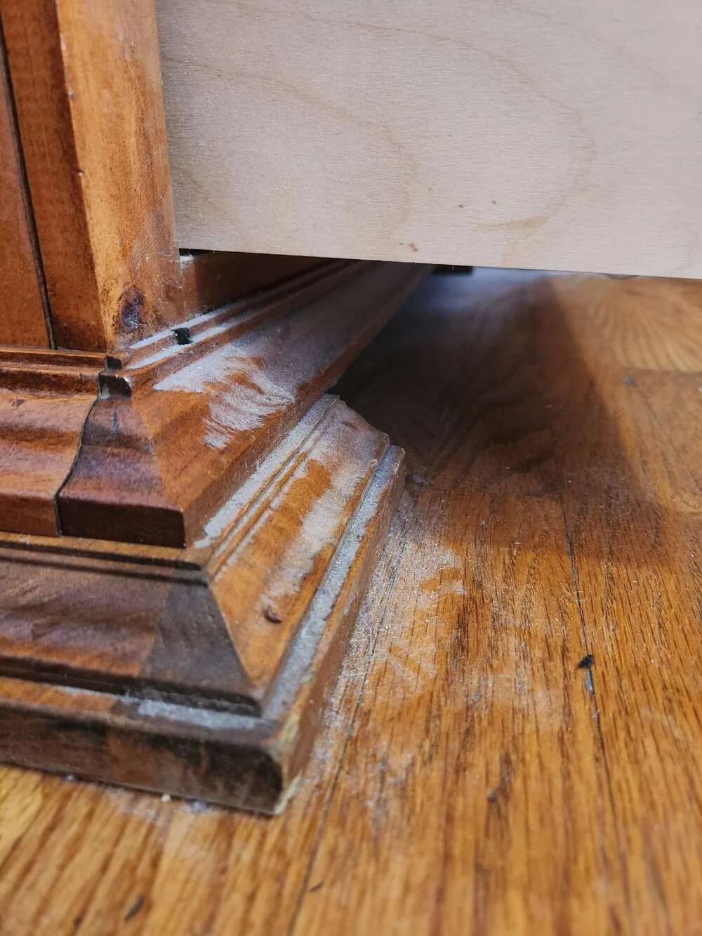 Wood trim and flooring during detailed cleaning