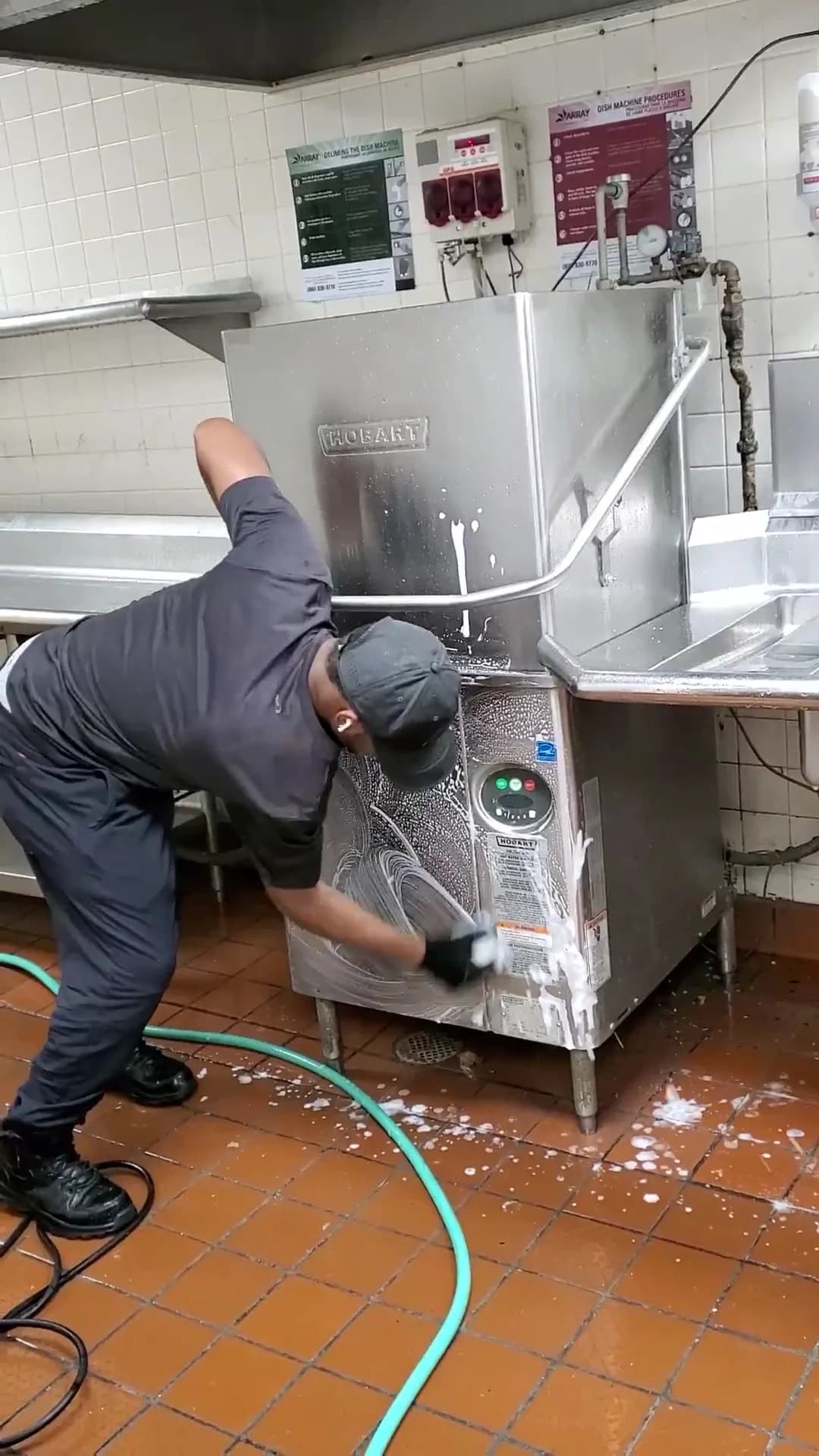 Technician restoring stainless refrigerator doors